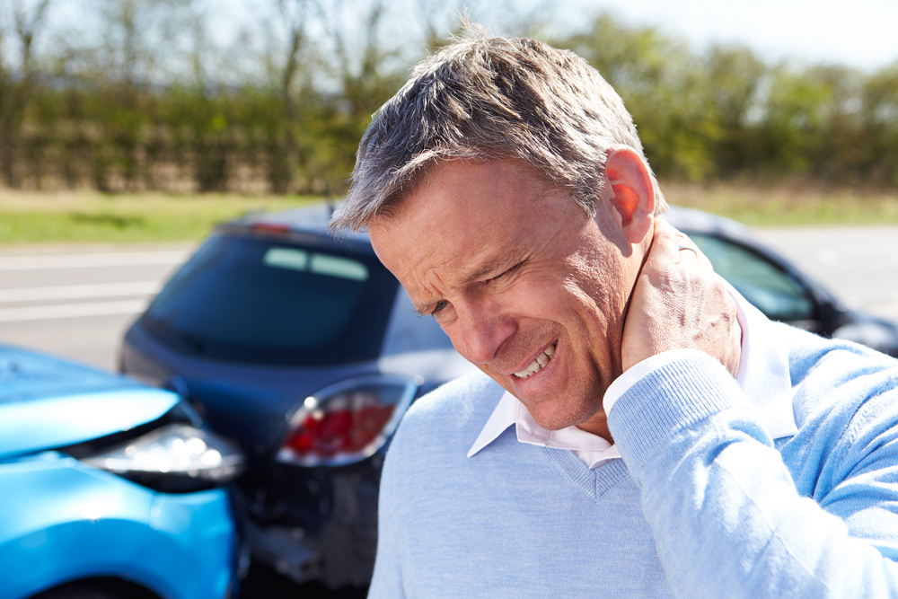 Man with whiplash needs chiropractic care in Dallas, TX.